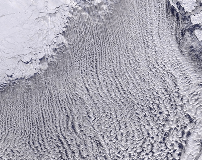 A satellite image of cloud patterns formed by a marine cold-air outbreak.